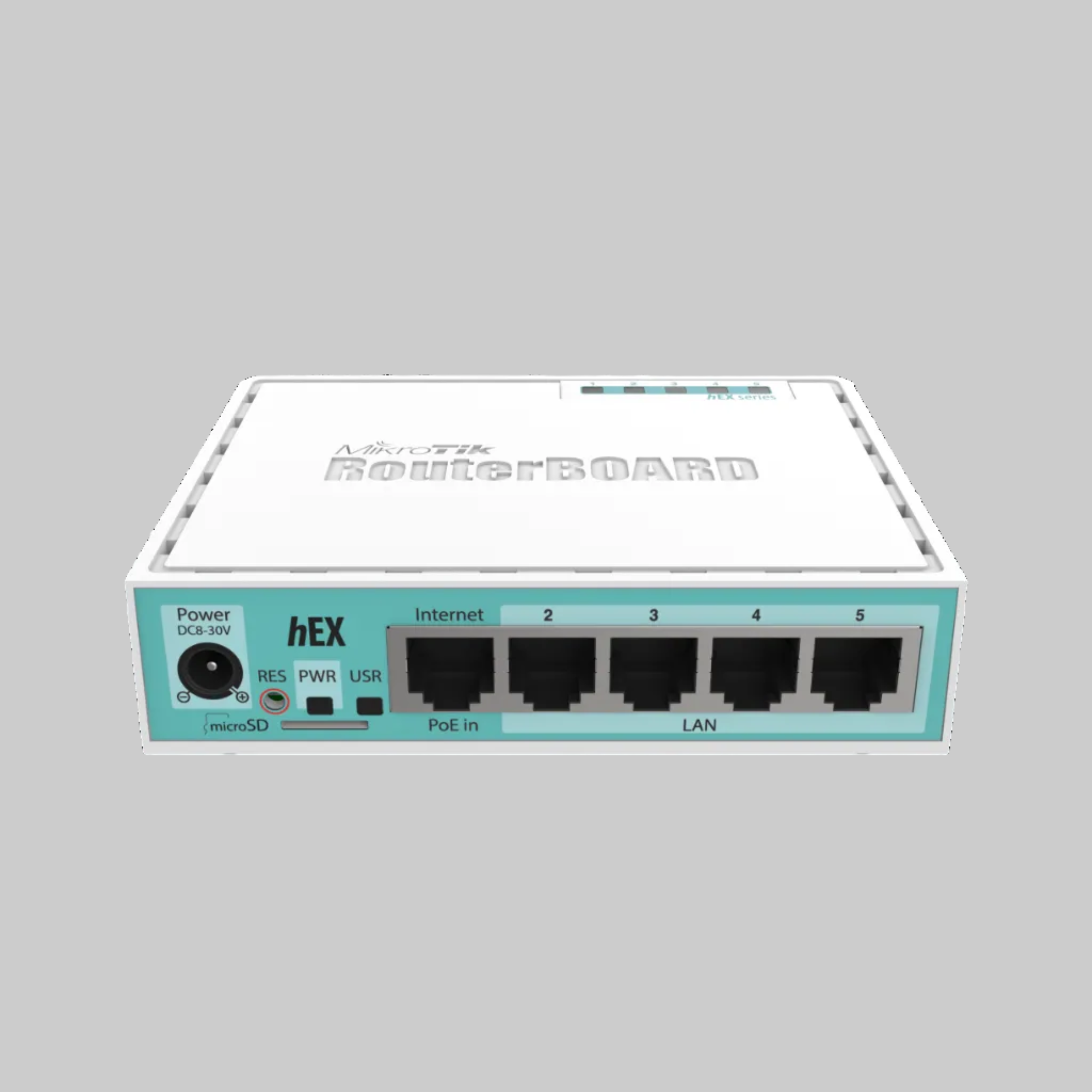 Primer plano del router MikroTik hEX con puertos Gigabit, entrada PoE y ranura microSD integrada