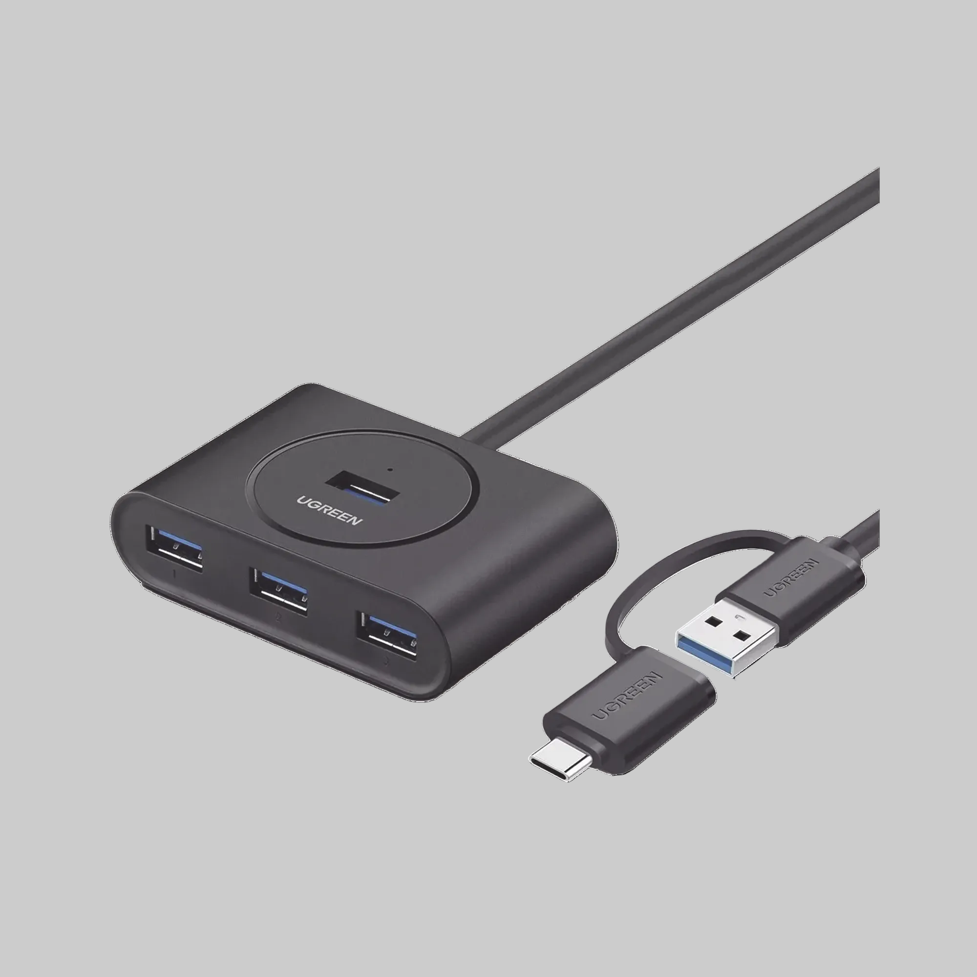 Hub USB Ugreen 40850 conectado a laptop mostrando 4 puertos USB 3.0 activos