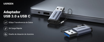Adaptador Ugreen USB-C conectando pendrive USB 3.0 a laptop moderna