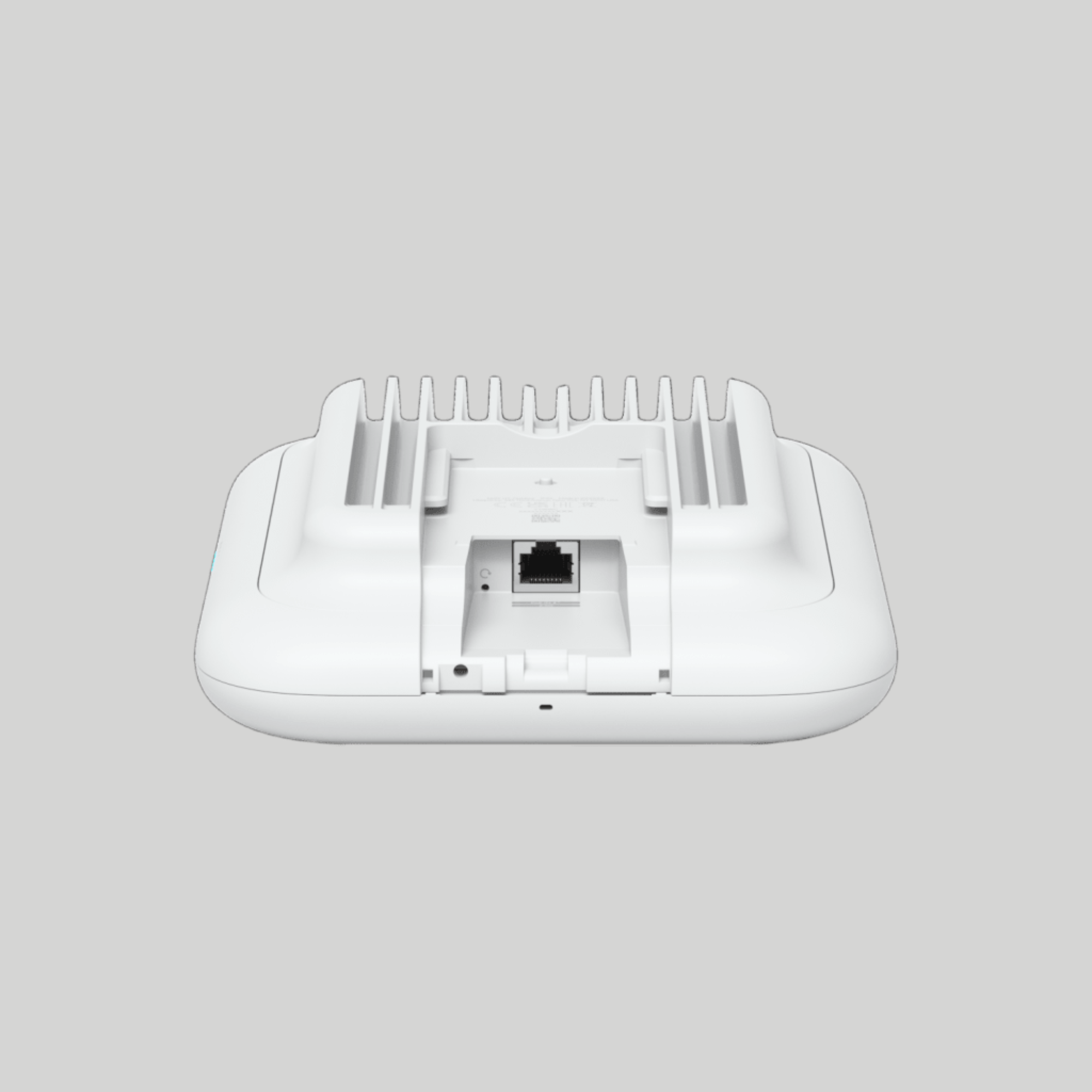 Detalle trasero del Access Point UniFi U7 con puerto Ethernet RJ45 para instalación de red empresarial