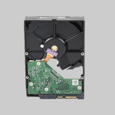 Parte trasera disco duro WD Blue 1TB con circuito PCB verde y conectores SATA para PC de escritorio